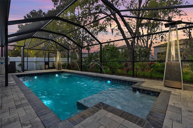 31123 Stone Arch Ave, Wesley Chapel, FL 33545 - view of swimming pool featuring a lanai, a patio area, and a fenced in pool
