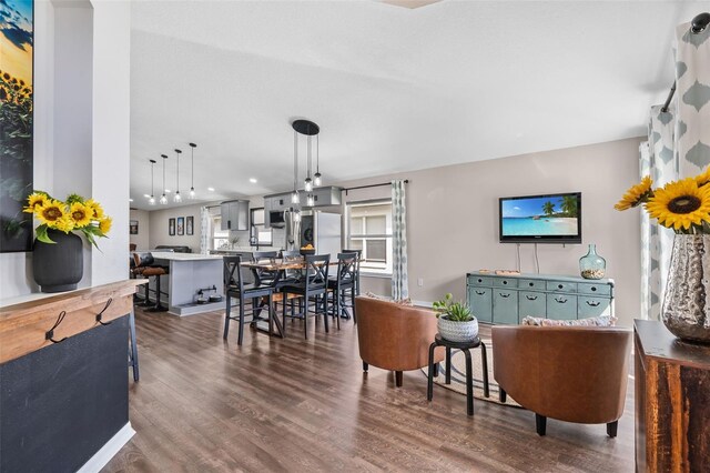 31123 Stone Arch Ave, Wesley Chapel, FL 33545 - living room featuring dark wood-style flooring and recessed lighting