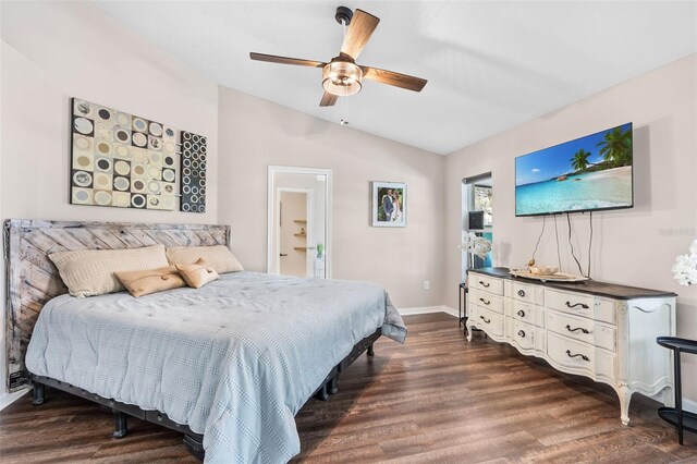 31123 Stone Arch Ave, Wesley Chapel, FL 33545 - bedroom featuring lofted ceiling, ceiling fan, baseboards, and dark wood finished floors