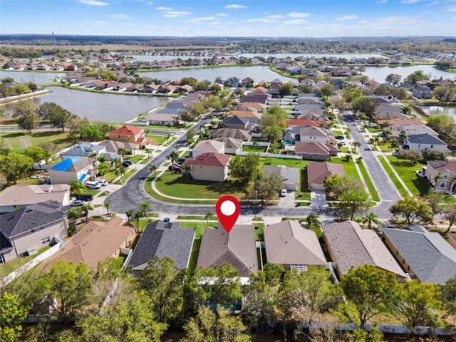 31123 Stone Arch Ave, Wesley Chapel, FL 33545 - birds eye view of property featuring a water view and a residential view