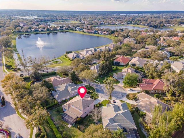 bird's eye view with a water view and a residential view