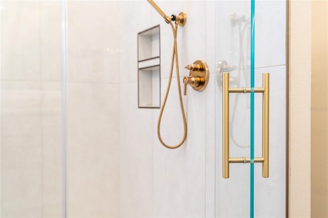 room details with a tile shower