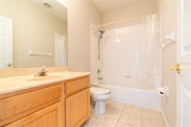 full bath with visible vents, toilet, tile patterned flooring, shower / bath combination with curtain, and vanity