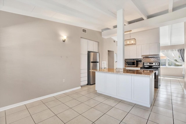 kitchen with vaulted ceiling with beams, stainless steel appliances, visible vents, white cabinets, and decorative backsplash