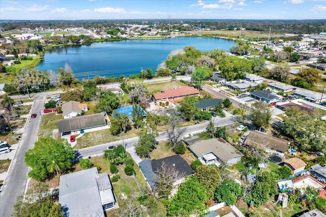 birds eye view of property featuring a water view and a residential view