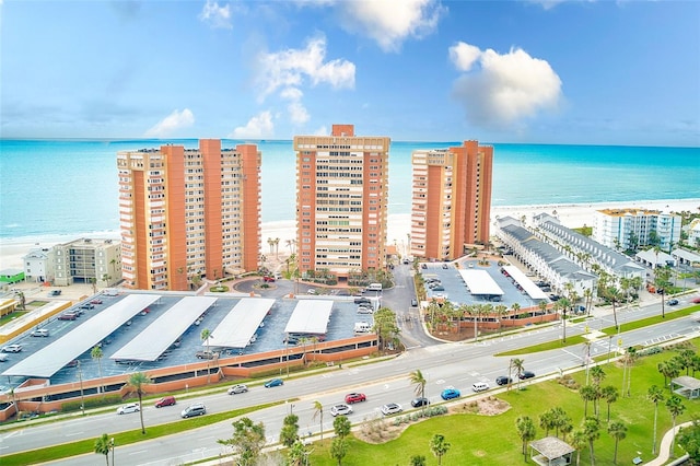 aerial view with a water view and a city view