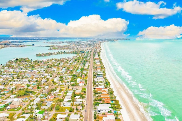 aerial view featuring a view of the beach and a water view