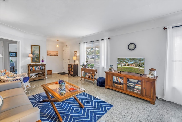 living room with speckled floor