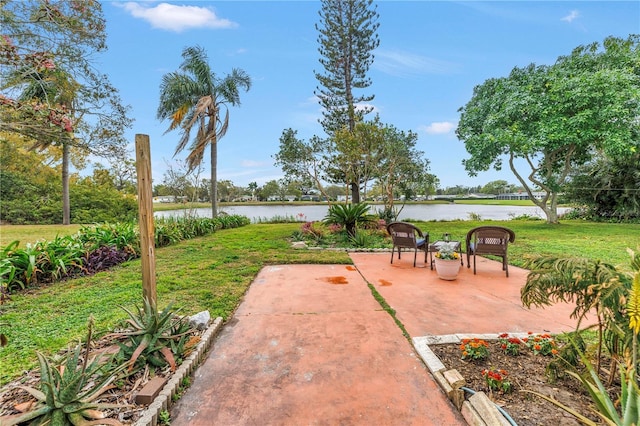 view of patio / terrace with a water view