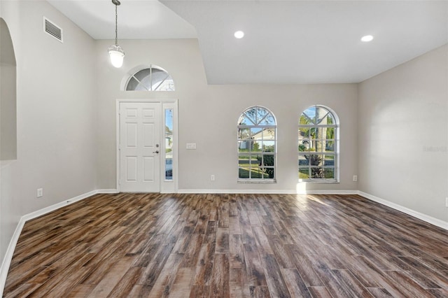 entrance foyer with recessed lighting, visible vents, baseboards, and wood finished floors