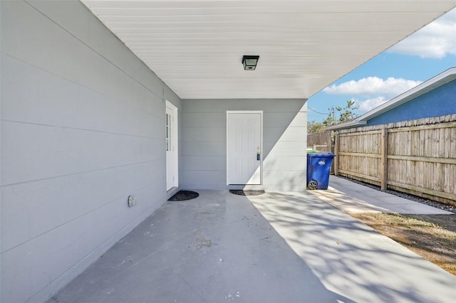 view of patio / terrace featuring fence