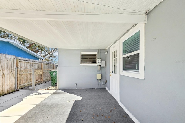 view of patio / terrace featuring fence