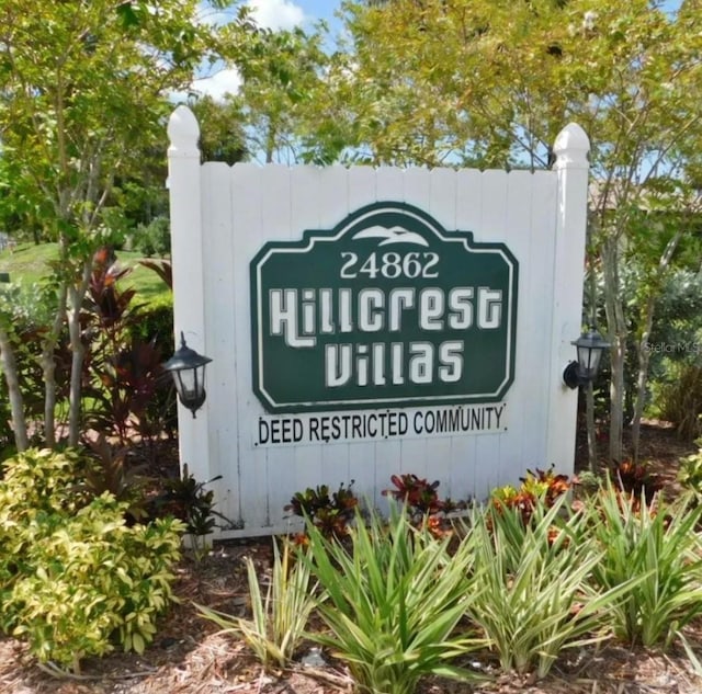 view of community sign