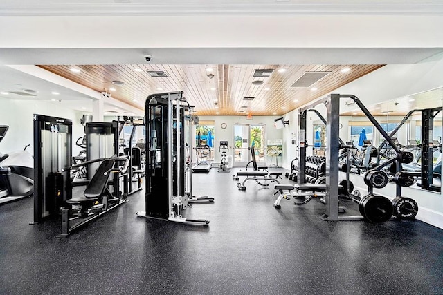 exercise room with recessed lighting, wooden ceiling, visible vents, and baseboards