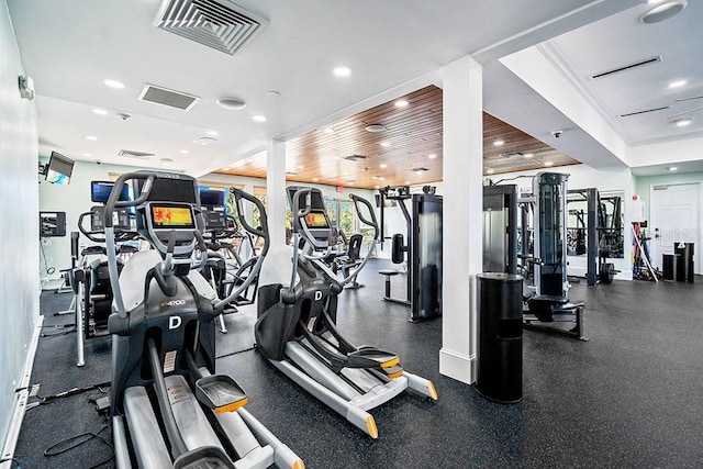 workout area featuring wood ceiling, visible vents, and recessed lighting