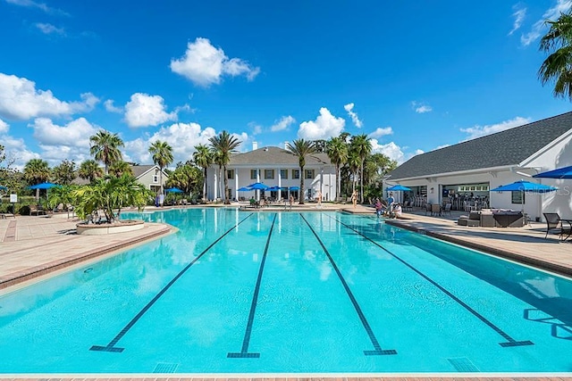 pool with a patio area