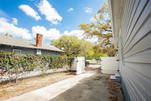 view of yard featuring a gate and fence