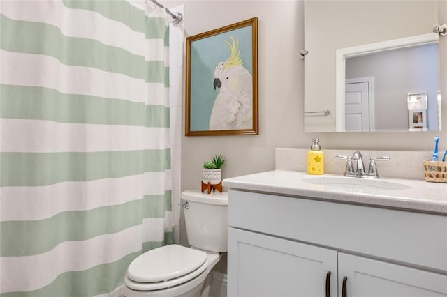 full bath featuring toilet, curtained shower, and vanity