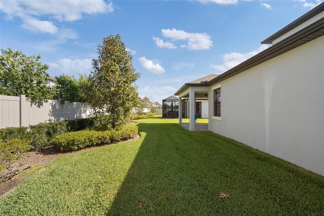 view of yard featuring fence