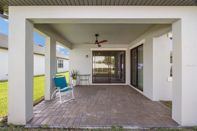 view of patio / terrace featuring ceiling fan