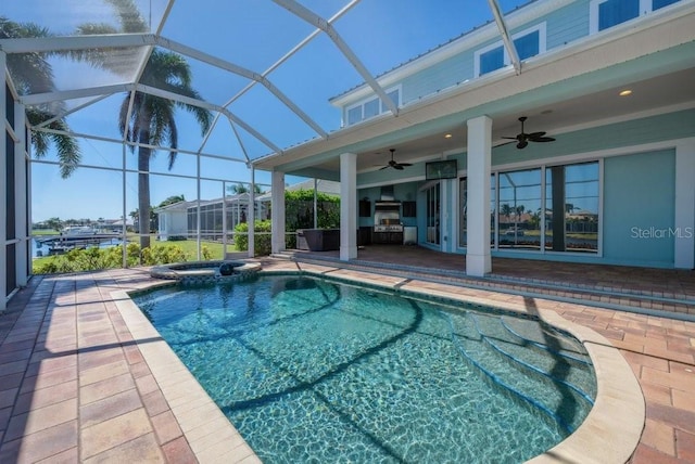 view of pool with a lanai, a pool with connected hot tub, a ceiling fan, and a patio