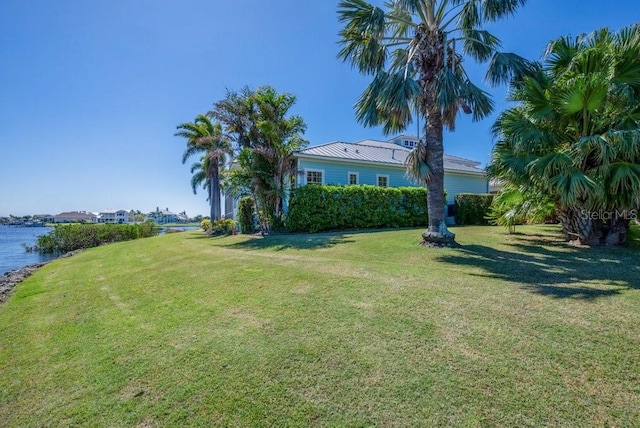 view of yard with a water view