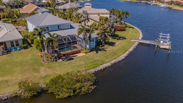 aerial view featuring a water view and a residential view