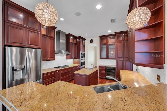 kitchen featuring stainless steel fridge with ice dispenser, wall chimney exhaust hood, gas cooktop, open shelves, and a sink