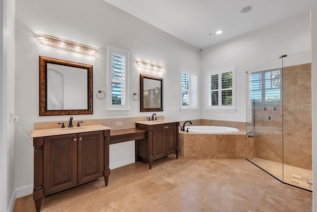 full bathroom with a garden tub, recessed lighting, a tile shower, and vanity