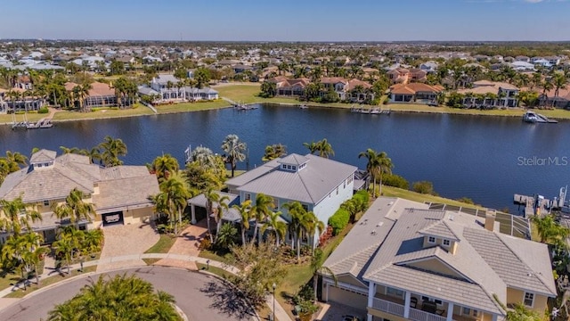 aerial view featuring a water view and a residential view