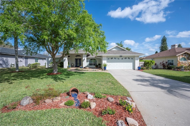 ranch-style house with an attached garage, a front lawn, and concrete driveway