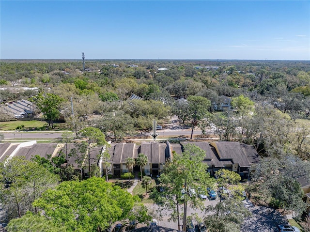 aerial view featuring a view of trees