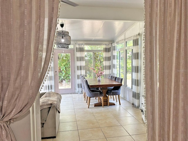 sunroom / solarium with lofted ceiling