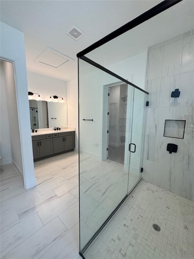 bathroom with toilet, a shower stall, visible vents, and vanity