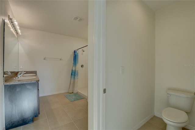 bathroom featuring toilet, tile patterned floors, vanity, visible vents, and a shower with curtain