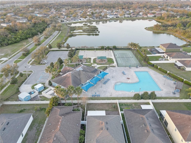 aerial view featuring a water view and a residential view