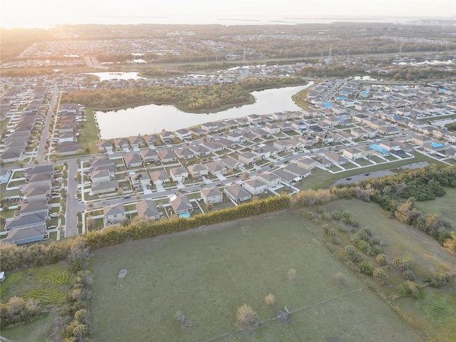 bird's eye view with a water view and a residential view