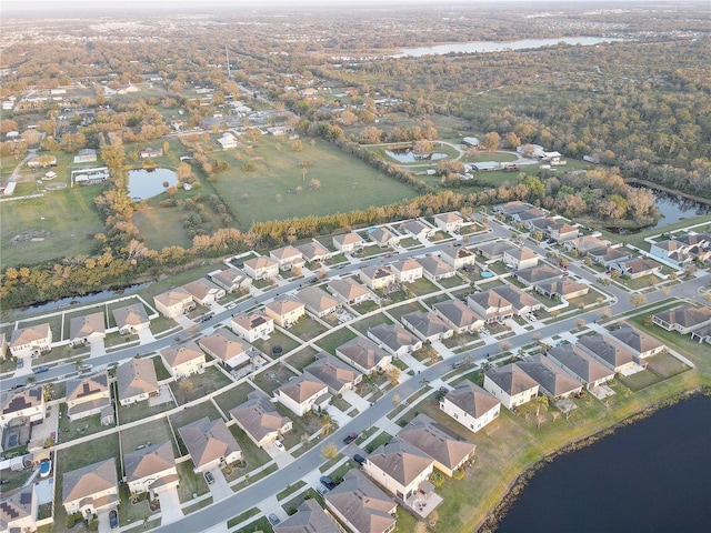 aerial view featuring a water view and a residential view