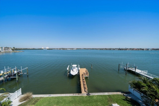 dock area with a water view and boat lift