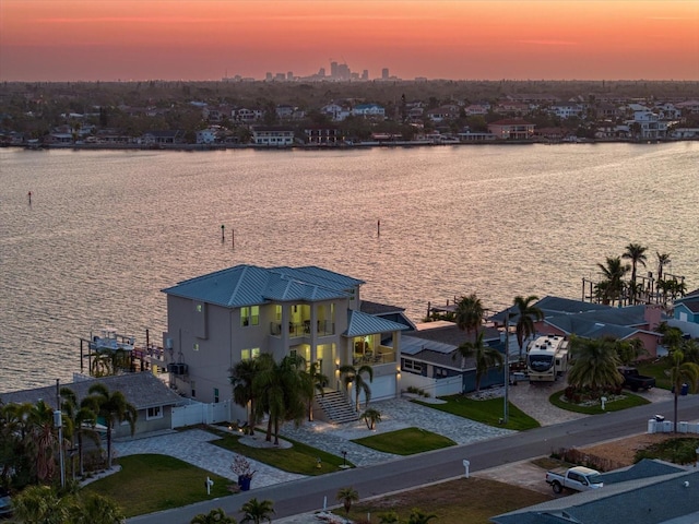 birds eye view of property featuring a water view