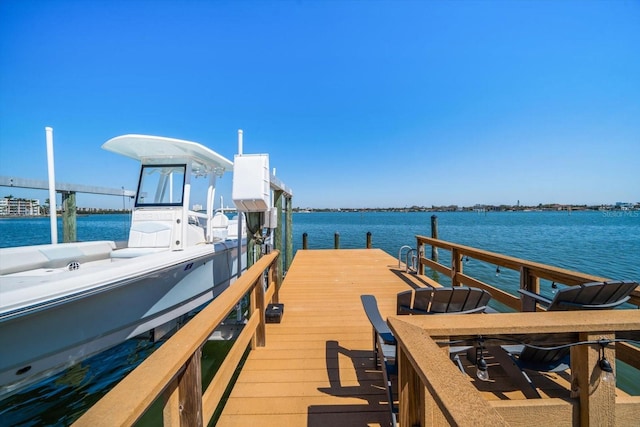 dock area featuring a water view and boat lift