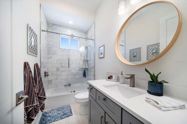 full bathroom with toilet, shower / bathing tub combination, and vanity