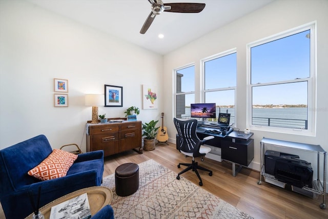 office space featuring ceiling fan, baseboards, wood finished floors, and recessed lighting