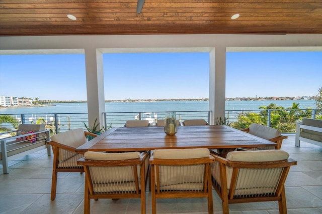 6976 S Shore Dr S, Saint Petersburg, FL 33707 - sunroom featuring wood ceiling, a water view, recessed lighting, and tile patterned floors