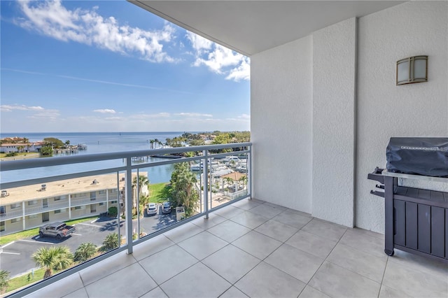 balcony featuring a water view