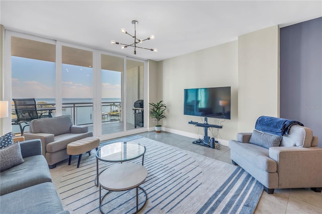 tiled living room featuring floor to ceiling windows, baseboards, and an inviting chandelier