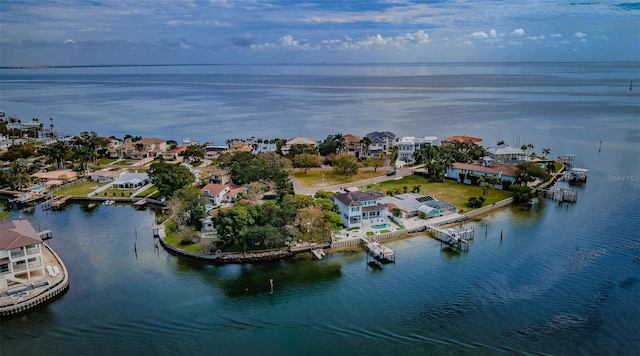 birds eye view of property with a residential view and a water view