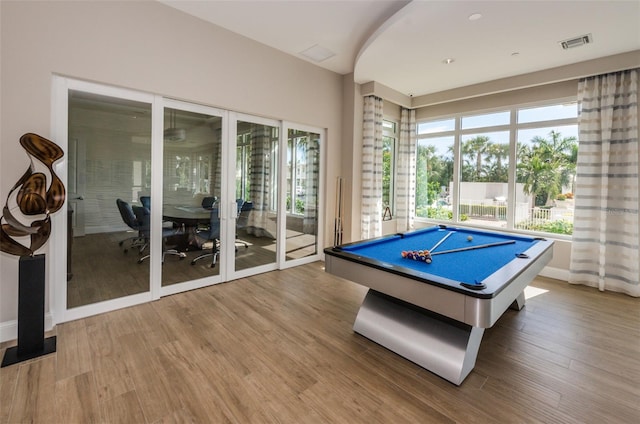 recreation room with billiards, visible vents, and wood finished floors