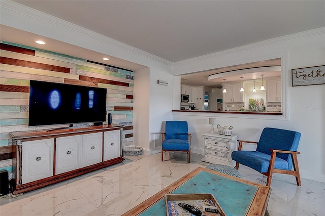 living room featuring visible vents, baseboards, an accent wall, ornamental molding, and marble finish floor