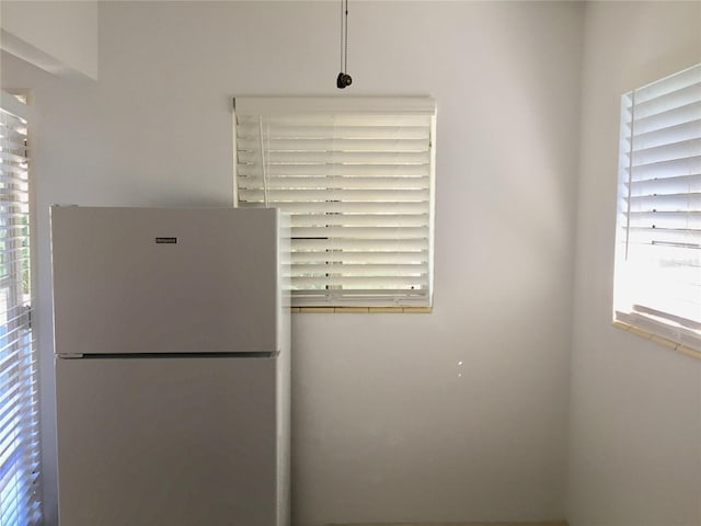 room details featuring freestanding refrigerator